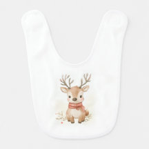 Baby reindeer sitting in the snow