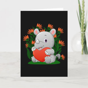 baby rhino is holding the colored heart balloon card