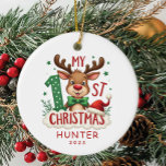 Baby’s First Christmas Personalized ornament<br><div class="desc">Celebrate your little one’s very first holiday season with this adorable “My 1st Christmas” ornament. Featuring a cute reindeer with a green polka dot # “1, ” festive Santa hat, and playful holiday accents, this keepsake ornament is the perfect addition to your family’s Christmas tree. Personalize it with your baby’s...</div>
