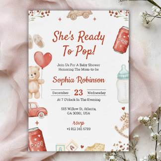 Baby shower invitation with playful teddy bear