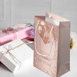 Baby shower rose gold blush glitter drips balloons small gift bag<br><div class="desc">A gift bag for a girly and glamorous baby shower.  A rose gold,  blush background with faux glitter drips,  paint dripping look and balloons. The text: The name is written in dark rose gold with a modern hand lettered style script. Personalize and add a date and name.</div>