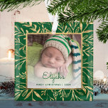 Babys 1st Christmas Photo Green Gold Foliage Glass Ornament<br><div class="desc">Celebrate baby's first Christmas with this beautiful keepsake ornament. Easily replace the sample image with your own favorite photo and customize it with baby's name in green script font and the year below. A white gradient screen helps make the text pop. The photo is set off by an elegant square...</div>