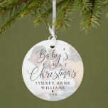 Baby's First Christmas Custom Name Photo Keepsake Ornament<br><div class="desc">Special keepsake ornament to commemorate baby's first Christmas. Design features a simple minimal design with "Baby's First Christmas" displayed in elegant script and serif text pairing with a photo displayed in the background with a white transparent overlay. Personalize with the baby's name and the year. The reverse side features the...</div>
