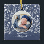 Baby's First Christmas Photo Blue Ceramic Ornament<br><div class="desc">Round glass Christmas tree ornament features your baby's photo surrounded with white leaves,  berries and dots on a blue background. TIP: Upload a high resolution,  photo that features the baby in the middle. Ornaments make memorable gifts for family and friends or create for yourself. MORE colors in our store.</div>