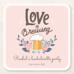 Bachelorette party love is brewing square paper coaster<br><div class="desc">Add a touch of charm to your bachelorette party with these 'Love is Brewing' paper coasters! Featuring an image of a beer glass with flowers and foliage on a pretty pink background,  personalized with the bride-to-be's name and date. Cheers to celebrating in style!</div>