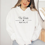 Bachelorette Party Team Bride Personalized Bridal Hoodie<br><div class="desc">Introducing our Team Bride Personalized Bridal Hoodie – the perfect addition to your bachelorette party festivities! Make a statement with this stylish and comfortable hoodie that boasts key attributes tailored to enhance your celebration. Celebrate in style with our eye-catching bachelorette party shirts! The hoodie is designed to be the ultimate...</div>