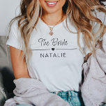 Bachelorette Party Team Bride Personalized Bridal T-Shirt<br><div class="desc">Introducing our Team Bride Personalized Bridal T-Shirt – the perfect blend of style, celebration, and personalization for your unforgettable bachelorette party! Immerse yourself in the joy of being part of the bride squad with these specially crafted shirts that are as unique as your bond. Designed with a heart motif, these...</div>