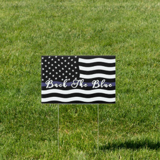 Back the blue, defend the police, back the badge sign