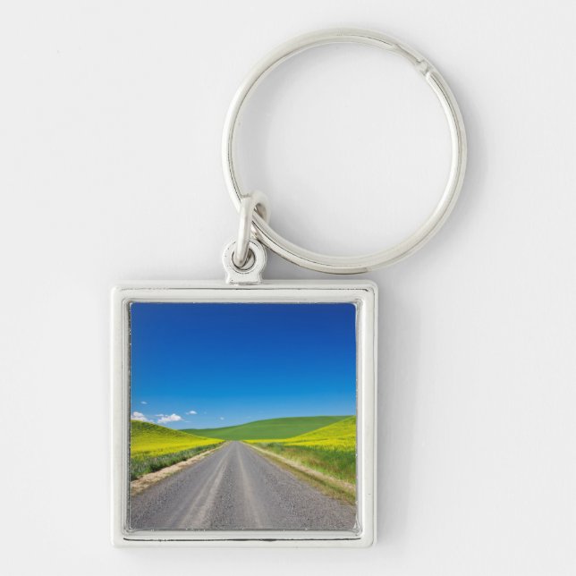 Backcountry road through Spring Canola Fields Keychain (Front)