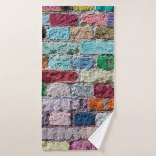 Background of painted color brick wall texture bath towel