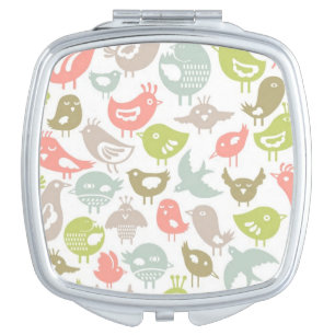 background with colorful birds ornament makeup mirror