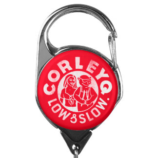 Badge holder with retractible cord.