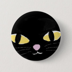 Badge with cat's eyes. button