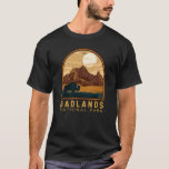 Badlands National Park Vintage Emblem T-Shirt<br><div class="desc">Badlands vector artwork design. The park’s dramatic landscapes span layered rock formations,  steep canyons and towering spires. Bison,  bighorn sheep and prairie dogs inhabit its sprawling grasslands.</div>