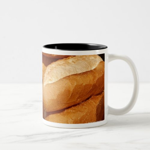 Baguette bread for sale in street by hawker Two_Tone coffee mug