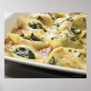 Baked pasta shells with spinach filling poster