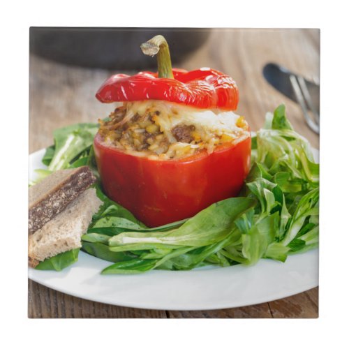 Baked stuffed peppers with meat sauce and cheese ceramic tile