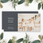 Baking Spirits Bright | Modern Stylish Kids Photo Holiday Card<br><div class="desc">Stylish modern holiday baking photo flat greeting card with a classic typography quote "baking spirits bright" with a dividing line and family name in white. The design features a bluish black charcoal gray color. The photo, greeting and name can be easily customized for a design as unique as your special...</div>