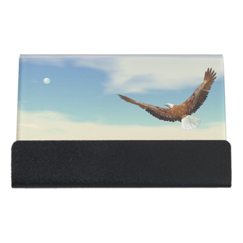 Bald eagle flying upon the ocean to the moon desk business card holder
