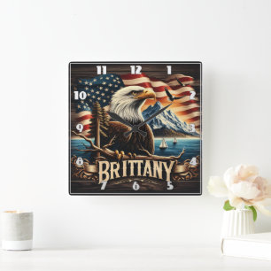 Bald Eagle Perched by Mountains and American Flag Square Wall Clock