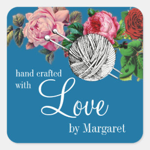 Balls of yarn knitting needles vintage roses label