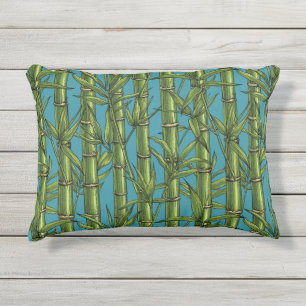 Bamboo forest on blue outdoor pillow