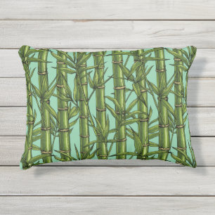 Bamboo forest on light blue outdoor pillow