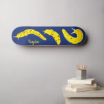 Banana Slugs Yellow and Royal Blue Personalized Skateboard<br><div class="desc">Create a personalized gift that's perfect for anyone who loves creepy crawly creatures. This skateboard features illustrations of banana slugs in a bright and cheery yellow set against a royal blue background. There's a spot to add a name in matching yellow lettering.</div>