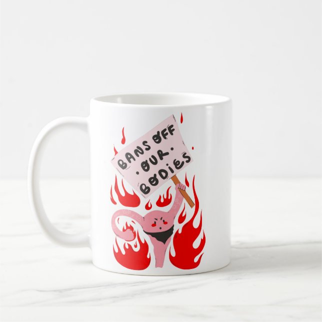 bans off our bodies womens rights angry uterus coffee mug (Left)