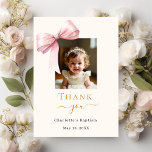 Baptism pink bow photo cream girl thank you card<br><div class="desc">A modern and elegant Baptism,  Christening thank you card for a girl. A soft cream colored background,  decorated with a large pink bow.  Black and golden letters. On the front the text: Thank You,  photo,  name,  and a date. 
Back: Template for Your thank you note and name.</div>