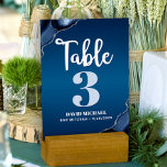 Bar Mitzvah Modern Navy Blue Ombre Agate Script Table Number<br><div class="desc">No Bar Mitzvah party is complete without personalized table number cards. Let your son be proud, rejoice and celebrate his milestone at his perfectly coordinated party. White calligraphy script, light blue gray and white typography, and steel blue agate rocks accented with faux silver veins overlay a deep navy blue ombre...</div>