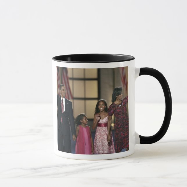 Barak Obama family wave at the last night of Mug (Right)