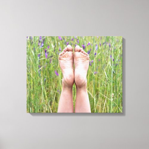 bare feet in wildflowers canvas print