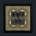 Baroque Black Gold Wedding Anniversary Gift Box<br><div class="desc">Baroque Damask inspired design with customizable text and monogram. A very stylish gold and black lace like design. Sleek and elegant custom Wedding, Anniversary or engagement present. Personalize with names, anniversary date and monogram or numbers - made into a wonderful wooden gift box to keep trinkets, jewellery box for your...</div>