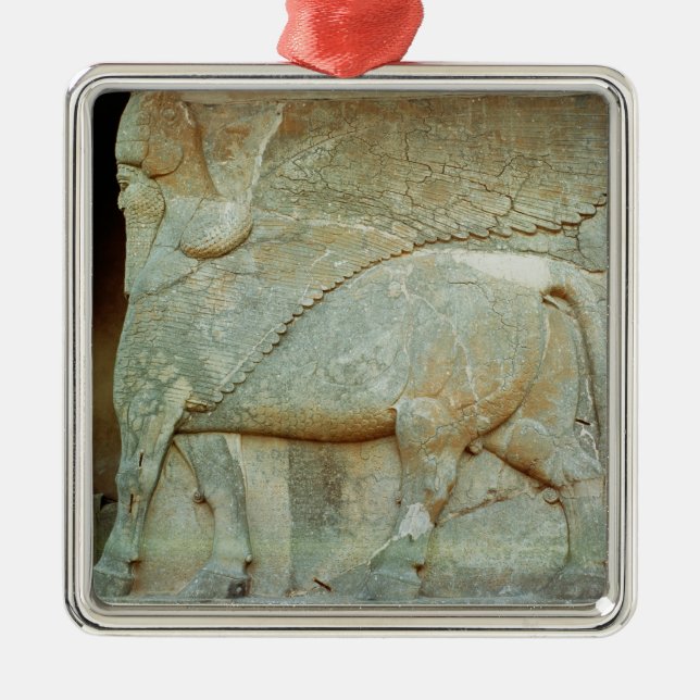Bas-relief of an anthropomorphic bull metal ornament (Front)