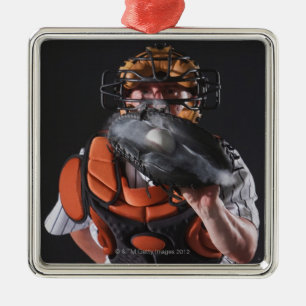 Baseball catcher holding ball in mitt metal ornament
