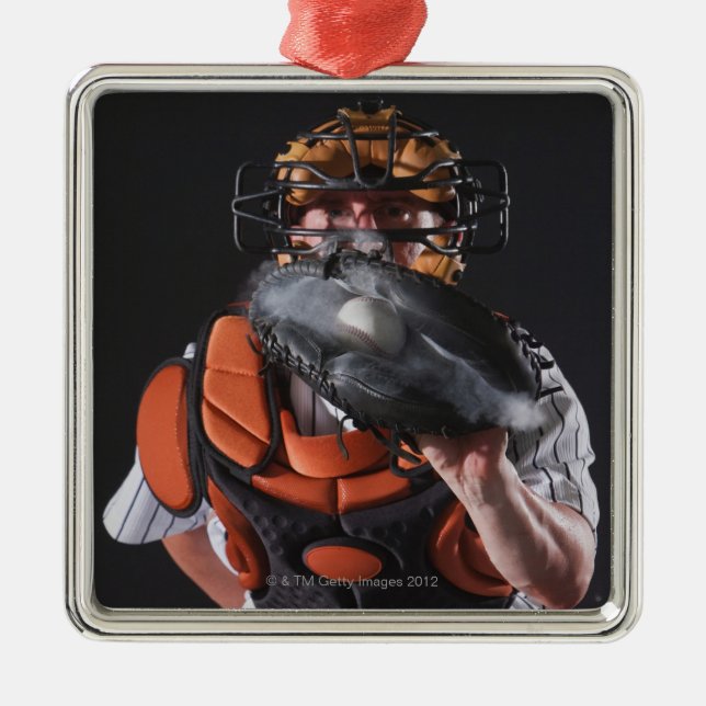 Baseball catcher holding ball in mitt metal ornament (Front)