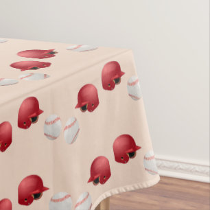 Baseball helmet and balls on tablecloth