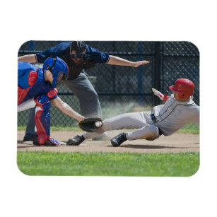 Baseball player sliding into home plate magnet