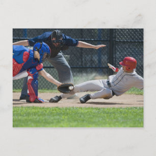 Baseball player sliding into home plate postcard
