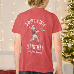 Baseball Santa Swingin' Into Christmas Tri-Blend Shirt<br><div class="desc">Step up to the plate this season in the “Swingin’ Into Christmas” t-shirt by Redwood & Vine Design Co. Featuring a watercolor Santa swinging a bat surrounded by festive baseball details, this cheerful red tee blends holiday spirit with America’s favorite pastime. Perfect for players, coaches, or baseball-loving families to wear...</div>