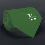 Basil Green Elegant Monogram   Name One-Sided Neck Tie<br><div class="desc">An elegant one-sided necktie featuring a bold white monogram across a solid Basil Green background. On top of this monogram sits your first or last name spelled out in all capitals. If you prefer a bolder look for the personal name inside of the large letter you can do the following:...</div>