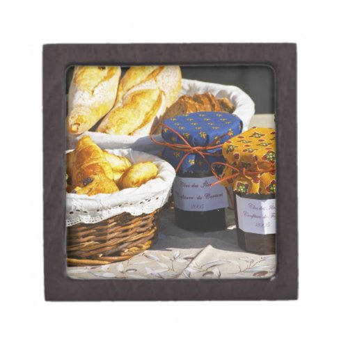 Basket with croissants and chocolate breads gift box