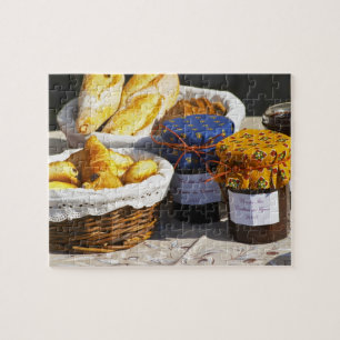 Basket with croissants and chocolate breads. jigsaw puzzle