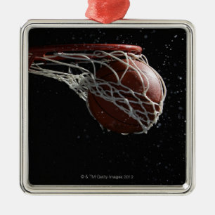 Basketball going through hoop 2 metal ornament