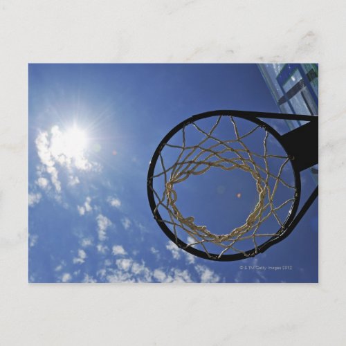 Basketball Hoop and the Sun against blue sky Postcard