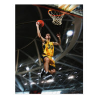 Basketball player  jumping in air postcard