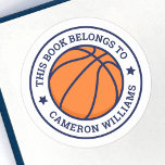 Basketball this book belongs to school name classic round sticker<br><div class="desc">Basketball book labels featuring a basketball at the centre and customizable text "this book belongs to" and your name in a college sports style font. All colors are customizable in the design tool.</div>