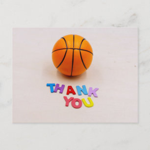 Basketball with thank you word wooden background postcard