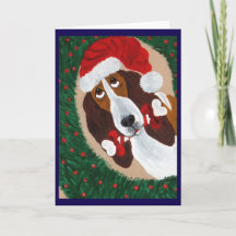 Basset Hound Santa looking through Wreath